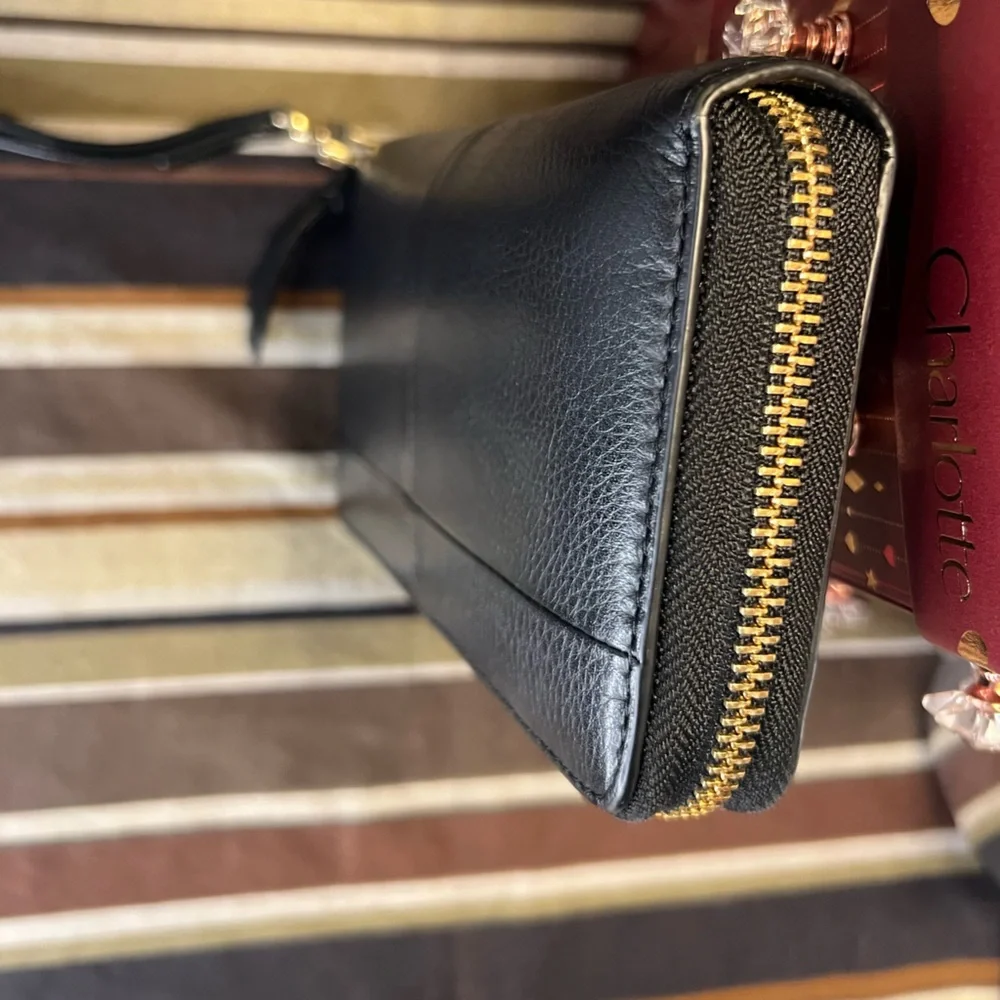 Tory Burch Black Wristlet with Gold Accents